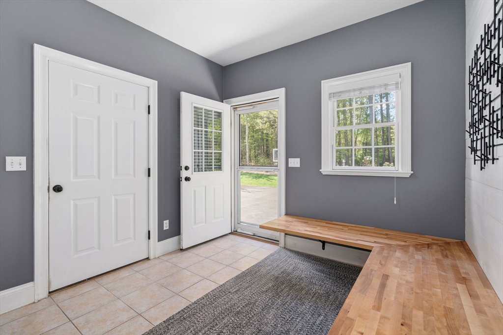 220 Newtown Road Acton, MA 01720 - Photo 14 of 39 a bedroom with a bed and a window