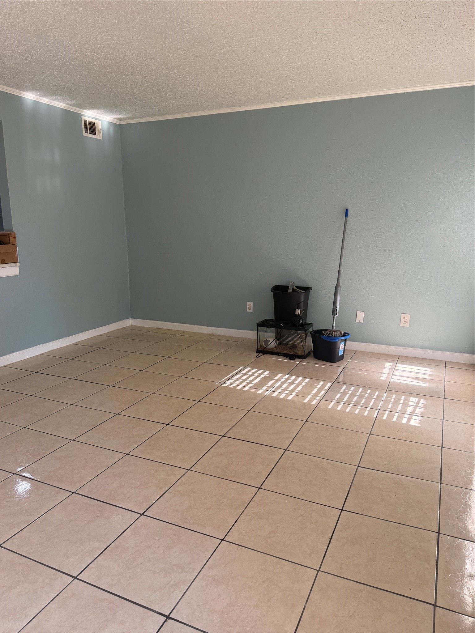 7402 Alabonson Road, Unit 407 Houston, TX 77088 - Photo 2 of 14 a view of an empty room and window