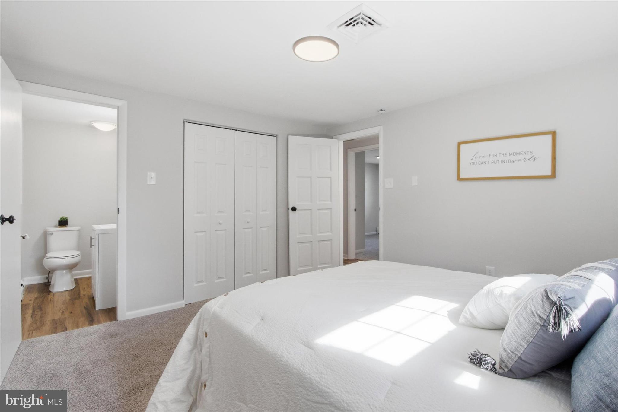 2571 Locust Road Dover, PA 17315 - Photo 12 of 27 a bedroom with a large bed and vanity