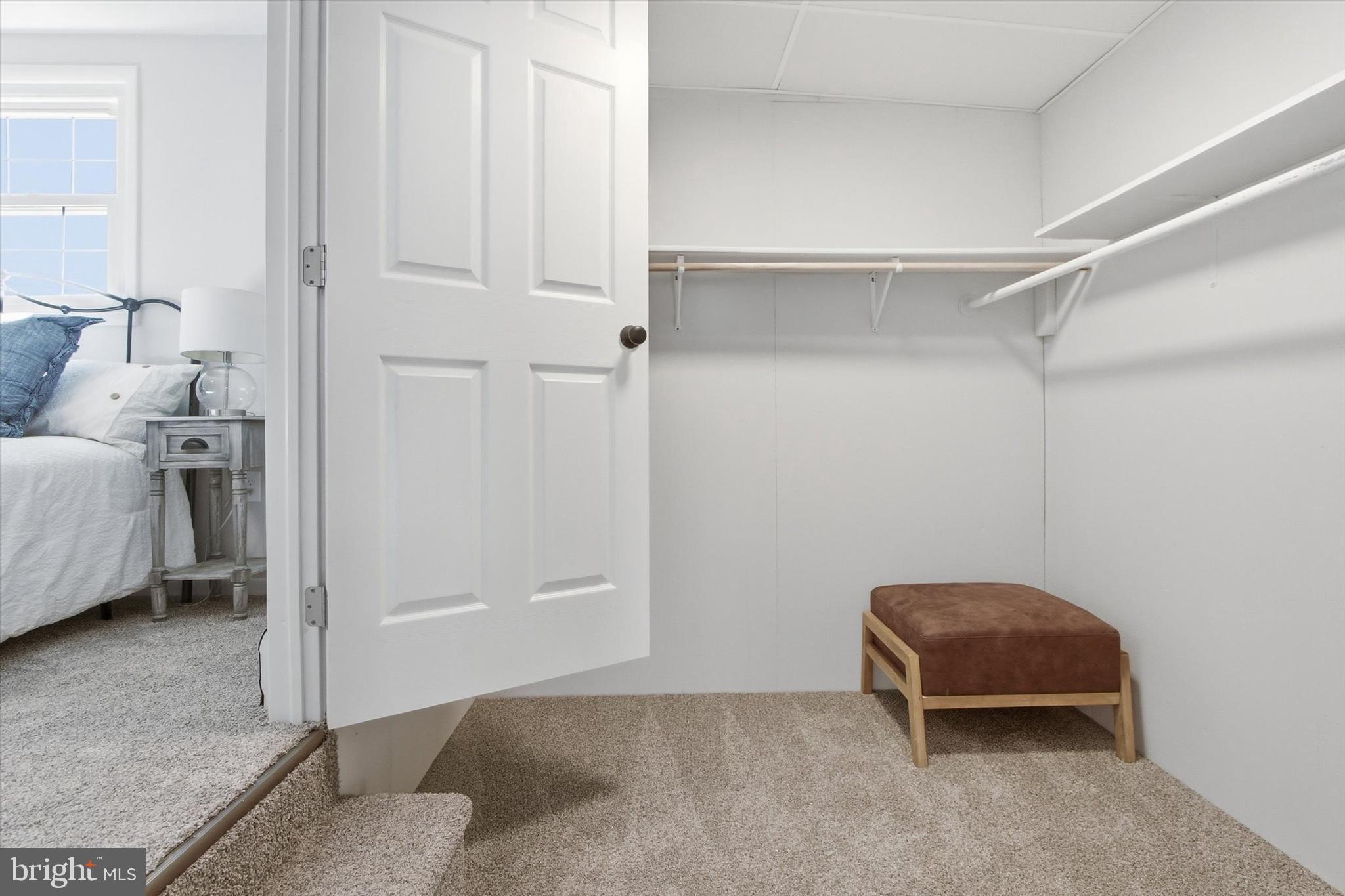 2571 Locust Road Dover, PA 17315 - Photo 14 of 27 a bedroom with a bed and a cabinets