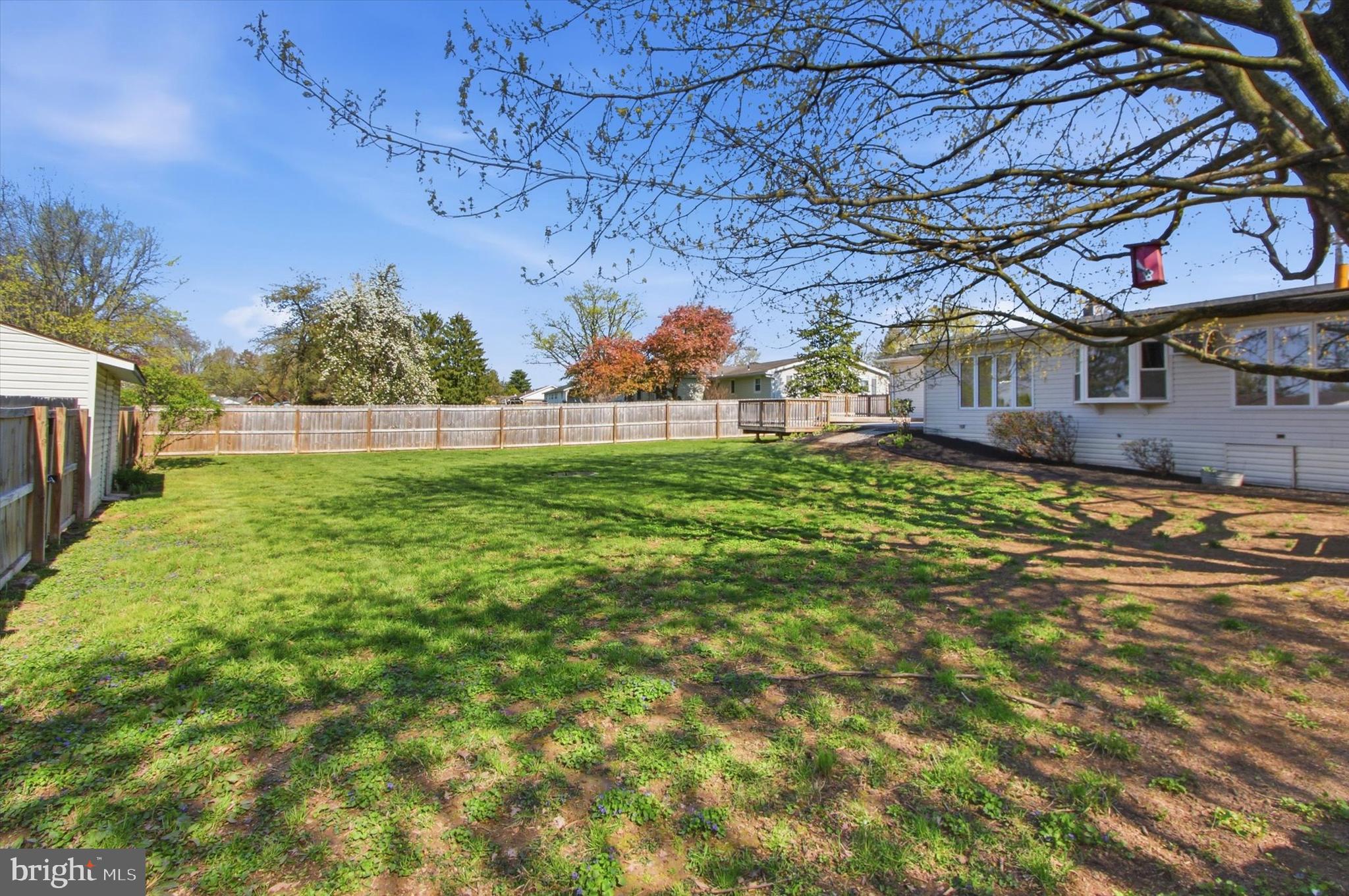 2571 Locust Road Dover, PA 17315 - Photo 24 of 27 a yellow house sitting in middle of a yard