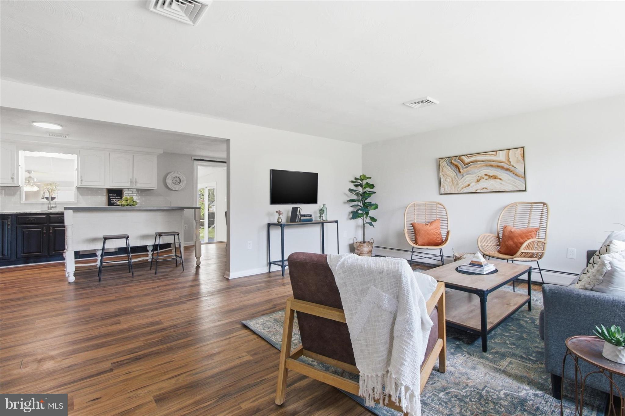 2571 Locust Road Dover, PA 17315 - Photo 6 of 27 a living room with furniture and a flat screen tv