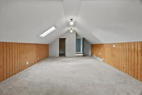 a view of empty room with floor to ceiling window