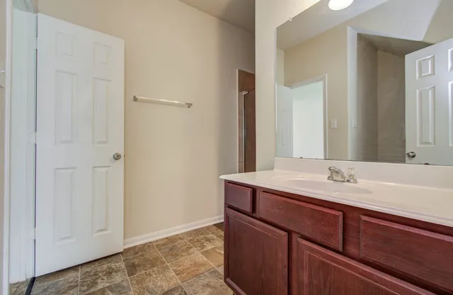 a view of a house with backyard