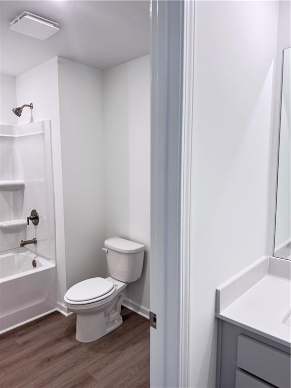 334 Silverleaf Trail Bethlehem, GA 30620 - Photo 24 of 30 a white toilet sitting next to a bathroom sink