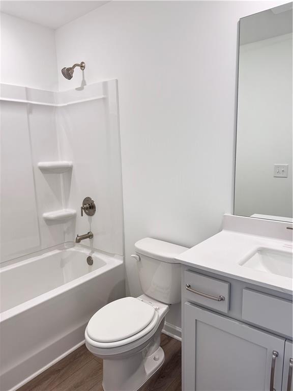 334 Silverleaf Trail Bethlehem, GA 30620 - Photo 26 of 30 a bathroom with a sink a toilet and bathtub
