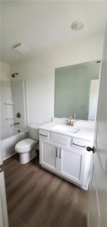 334 Silverleaf Trail Bethlehem, GA 30620 - Photo 6 of 30 a bathroom with a double vanity sink toilet and a mirror