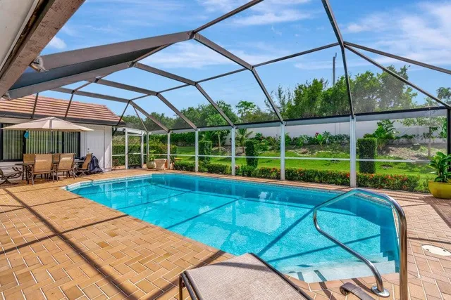 a view of a patio with a backyard