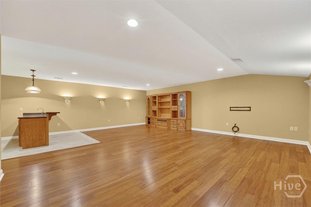 94 Rookery View Drive Midway, GA 31320 - Photo 28 of 46 Upstairs media/bonus room with wet bar.