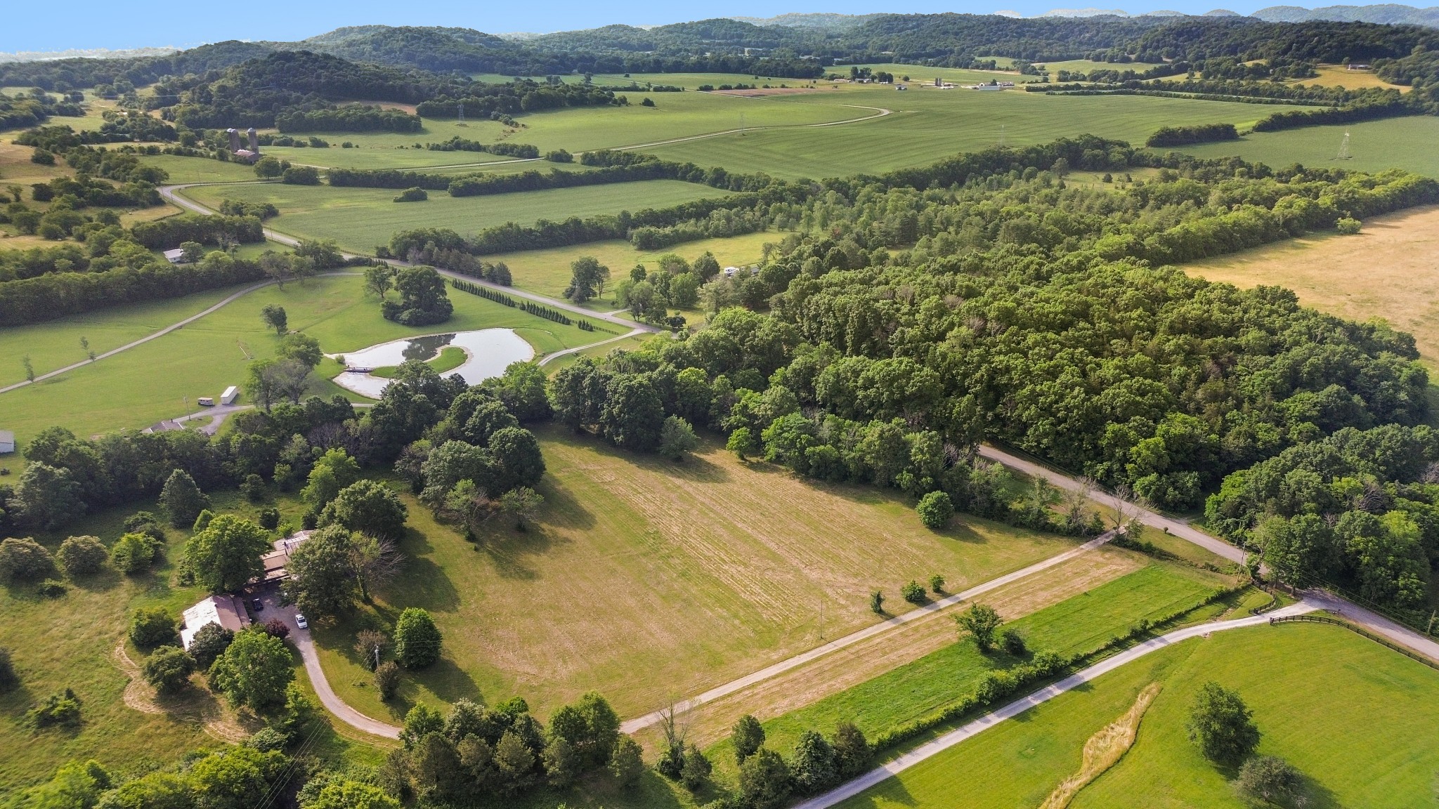 1896 West Harpeth Road Franklin, TN 37064 - Photo 5 of 24 a view of a lake with a mountain
