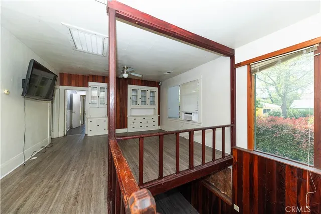 a view of a hallway with windows