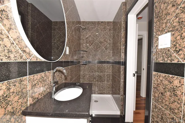 a bathroom with a toilet and a sink