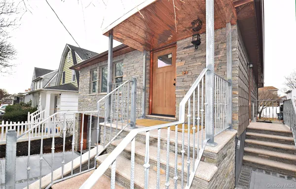 a view of a building with wooden floor and fence