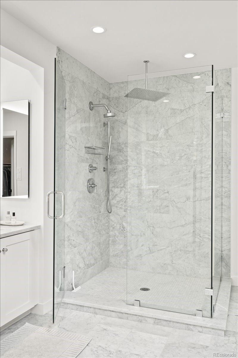 535 Garfield Street Denver, CO 80206 - Photo 34 of 50 a bathroom with a shower
