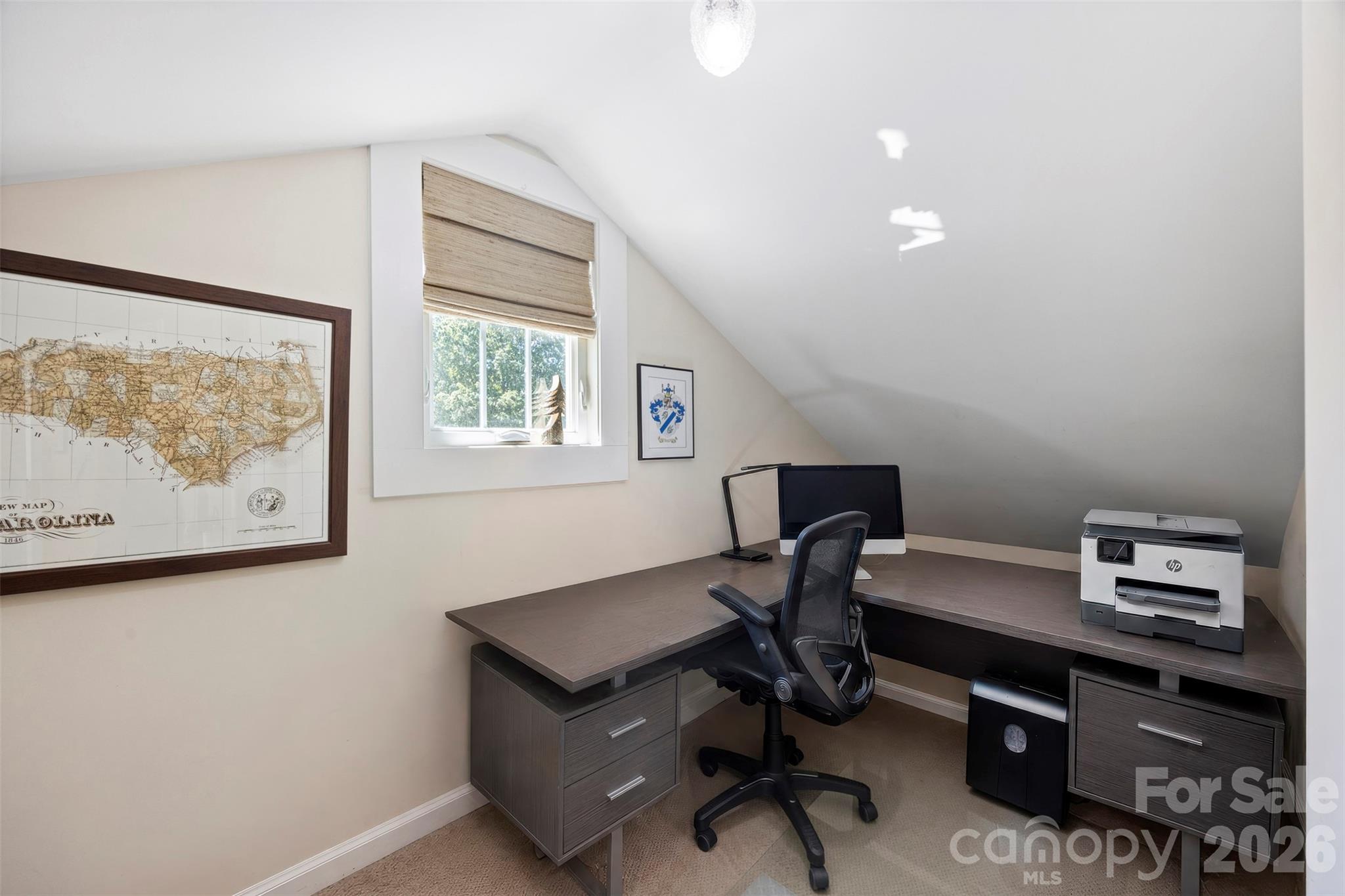 207 West Academy Street Cherryville, NC 28021 - Photo 31 of 45 a view of a workspace with furniture and a window
