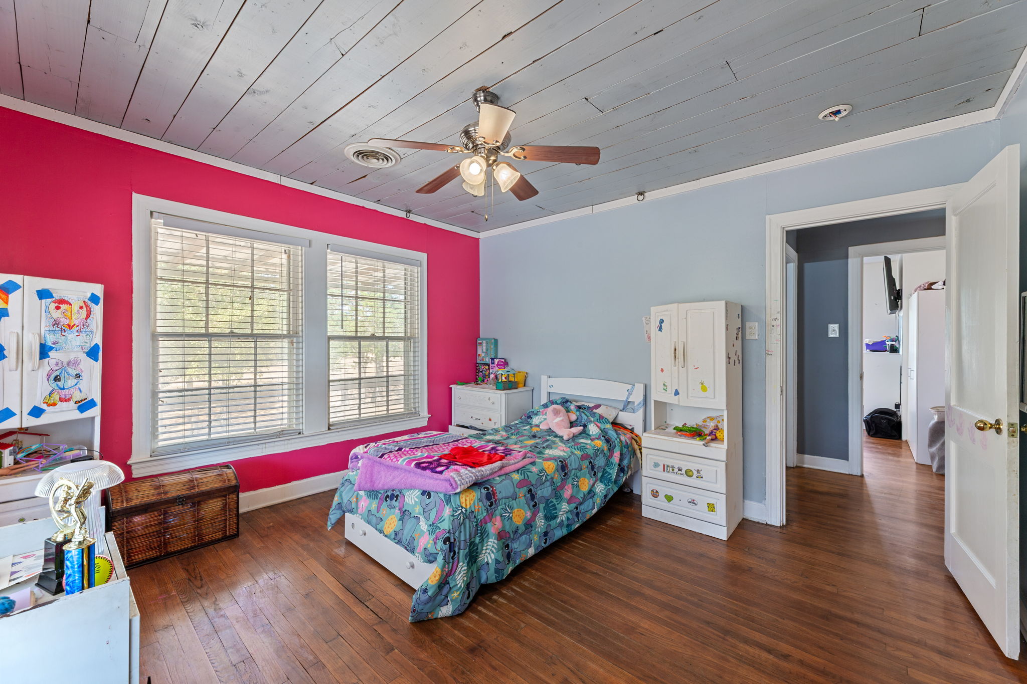 274 Old Potato Road Paige, TX 78659 - Photo 17 of 39 Bedroom with dark wood-style flooring, wooden ceiling, crown molding, and ceiling fan
