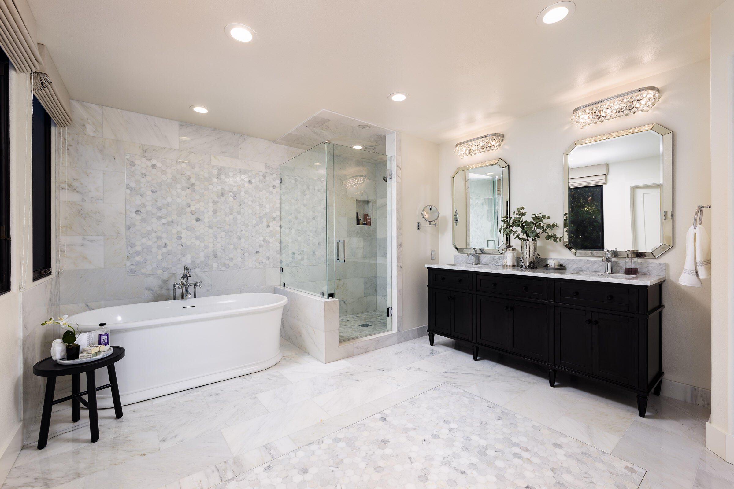1215 Miracanon Lane Santa Barbara, CA 93109 - Photo 14 of 40 a bathroom with a bathtub sink and a mirror