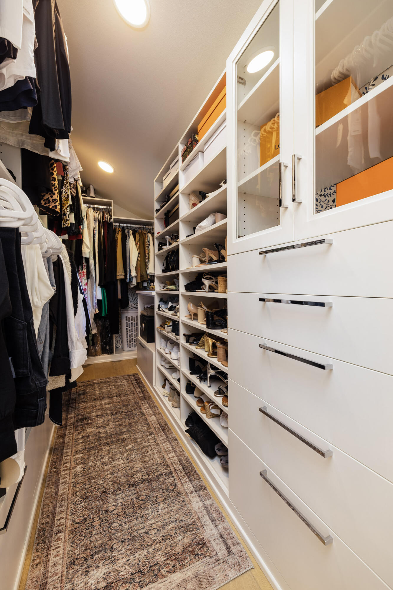 1215 Miracanon Lane Santa Barbara, CA 93109 - Photo 15 of 40 a view of walk in closet with clothes and shoes