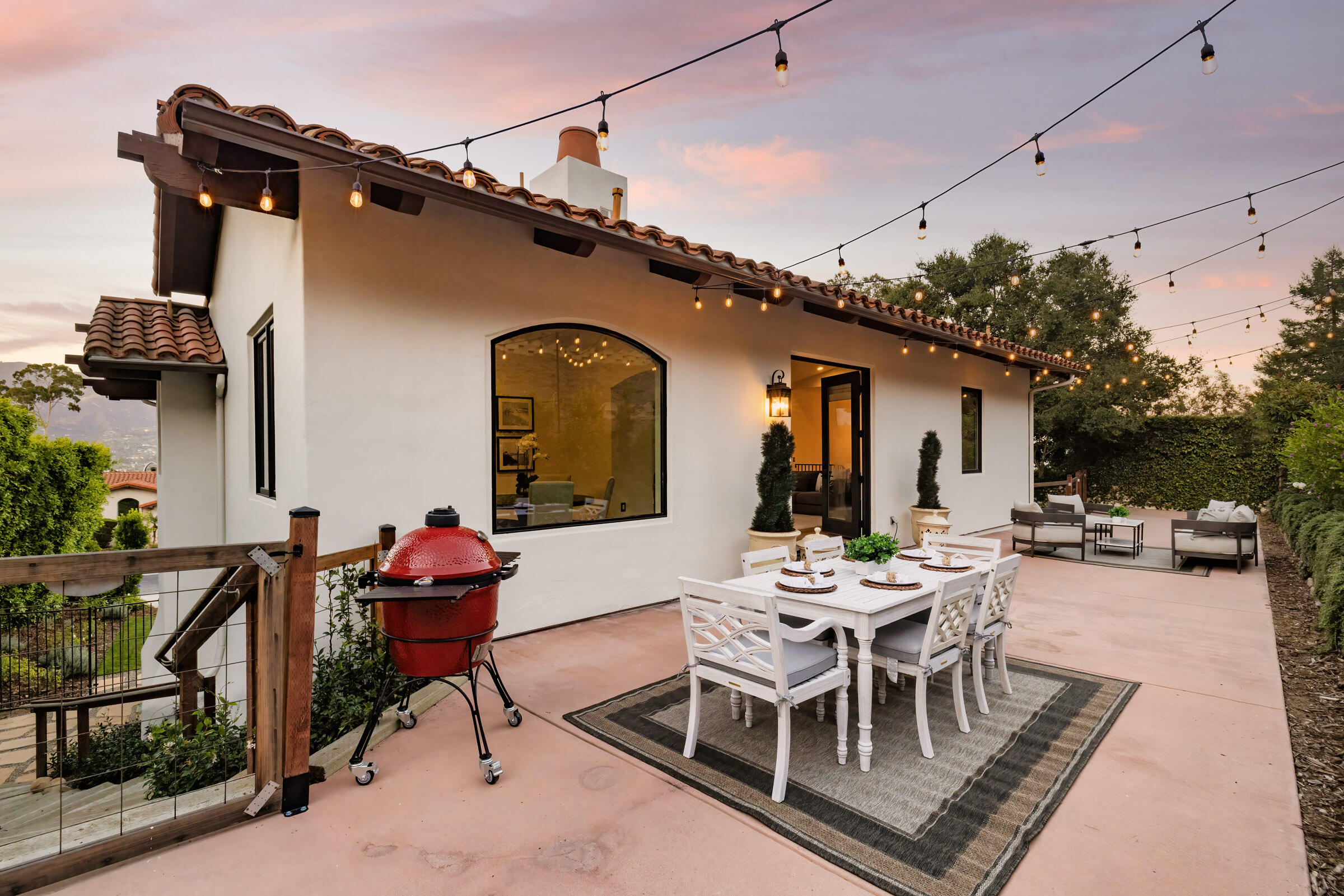 1215 Miracanon Lane Santa Barbara, CA 93109 - Photo 18 of 40 a dining room with furniture and wooden floor