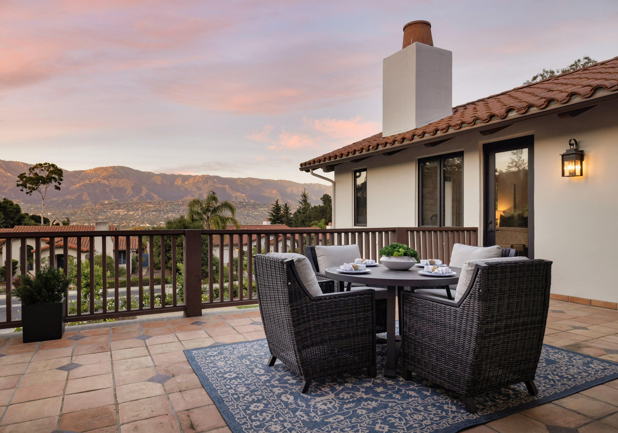 1215 Miracanon Lane Santa Barbara, CA 93109 - Photo 21 of 40 a roof deck with table and chairs