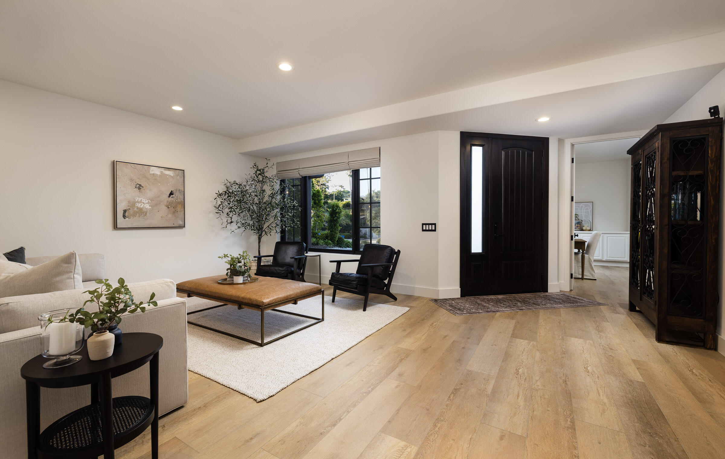 1215 Miracanon Lane Santa Barbara, CA 93109 - Photo 22 of 40 a living room with furniture and wooden floor