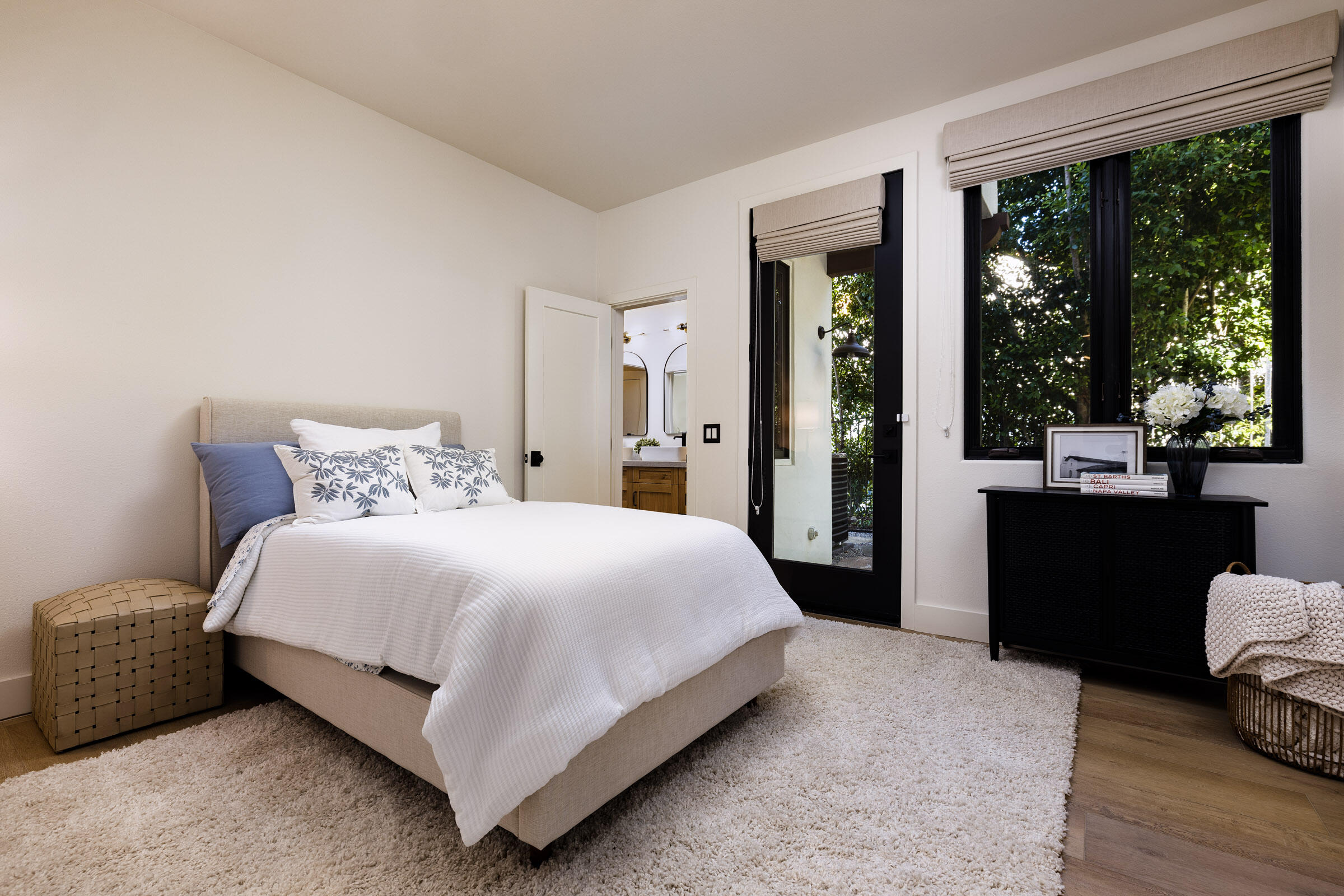 1215 Miracanon Lane Santa Barbara, CA 93109 - Photo 26 of 40 a bedroom with a bed and a large window