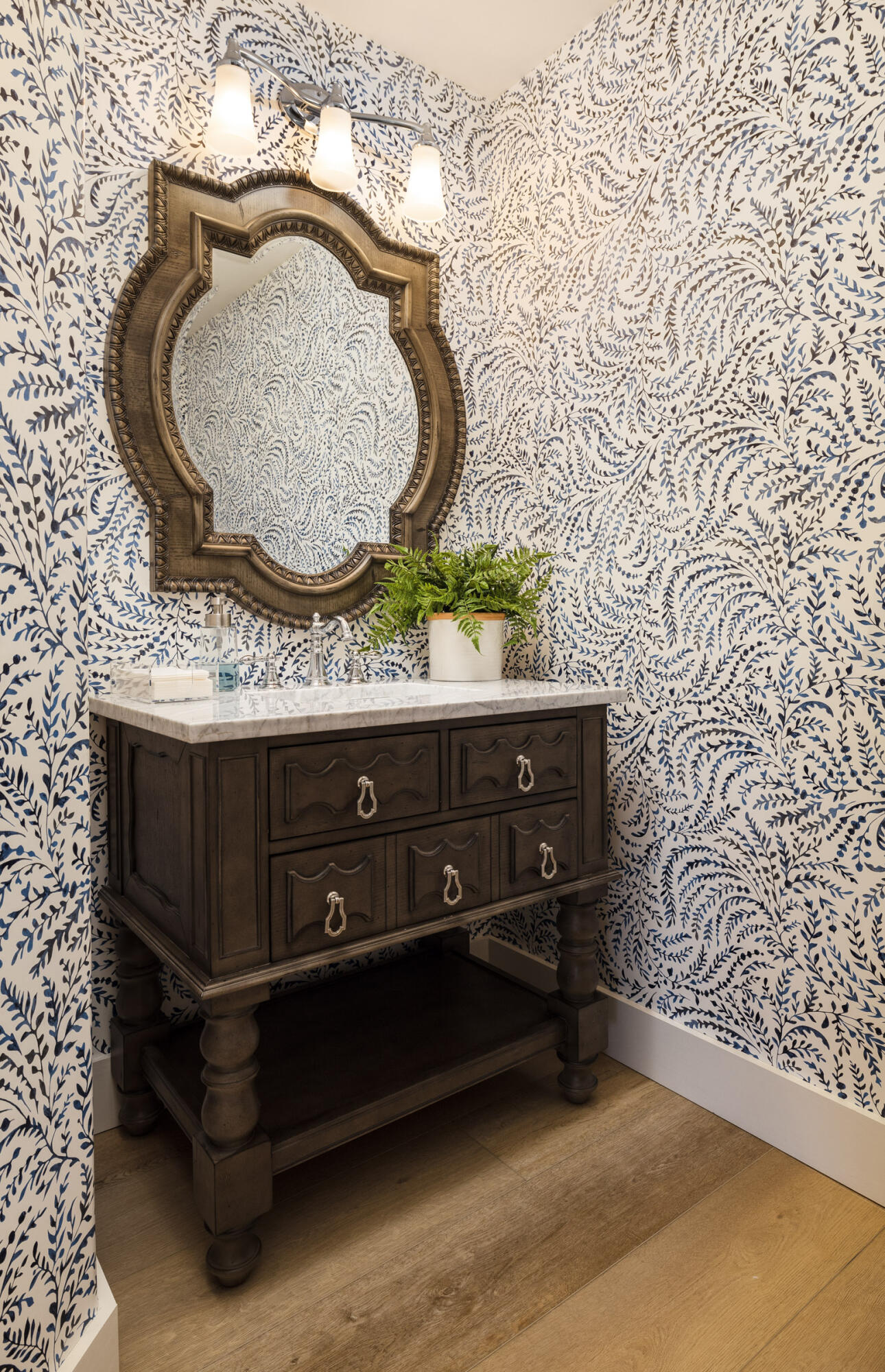 1215 Miracanon Lane Santa Barbara, CA 93109 - Photo 29 of 40 a room with a sink and a mirror