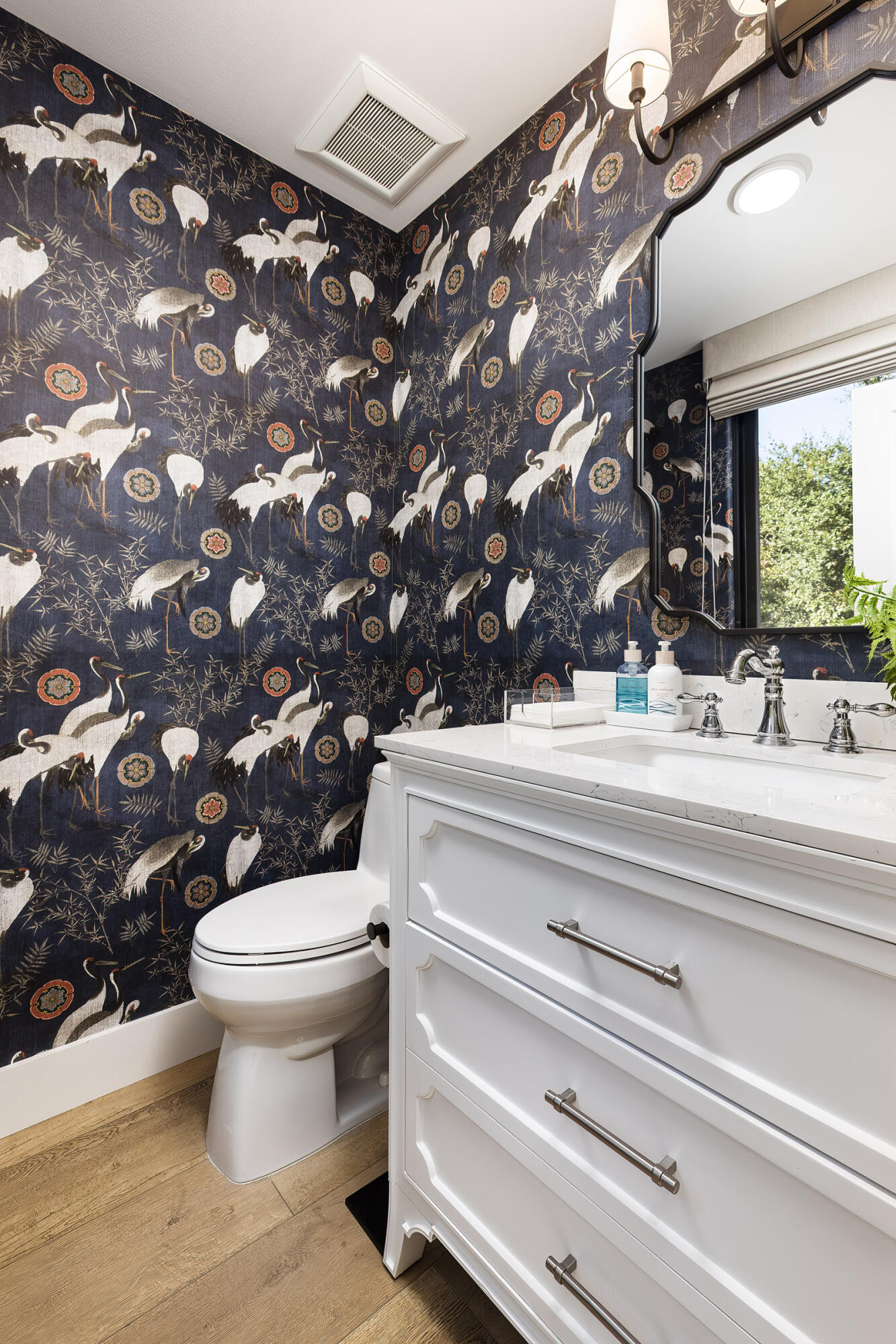 1215 Miracanon Lane Santa Barbara, CA 93109 - Photo 30 of 40 a bathroom with a sink and a toilet