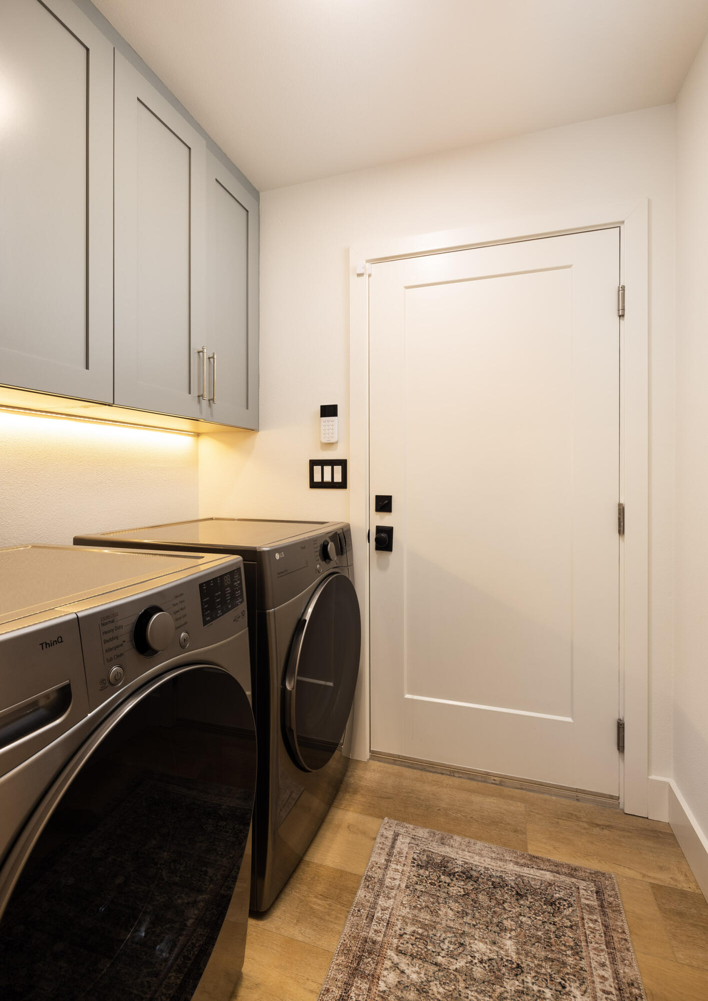 1215 Miracanon Lane Santa Barbara, CA 93109 - Photo 31 of 40 a utility room with dryer and washer