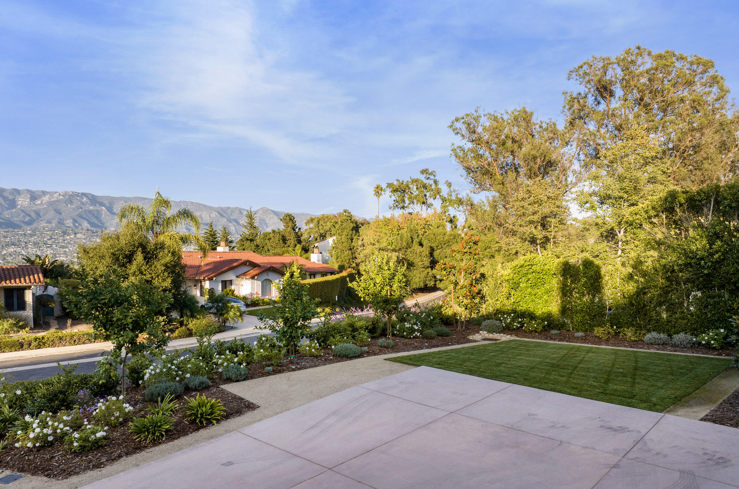 1215 Miracanon Lane Santa Barbara, CA 93109 - Photo 32 of 40 a view of a pathway with a garden