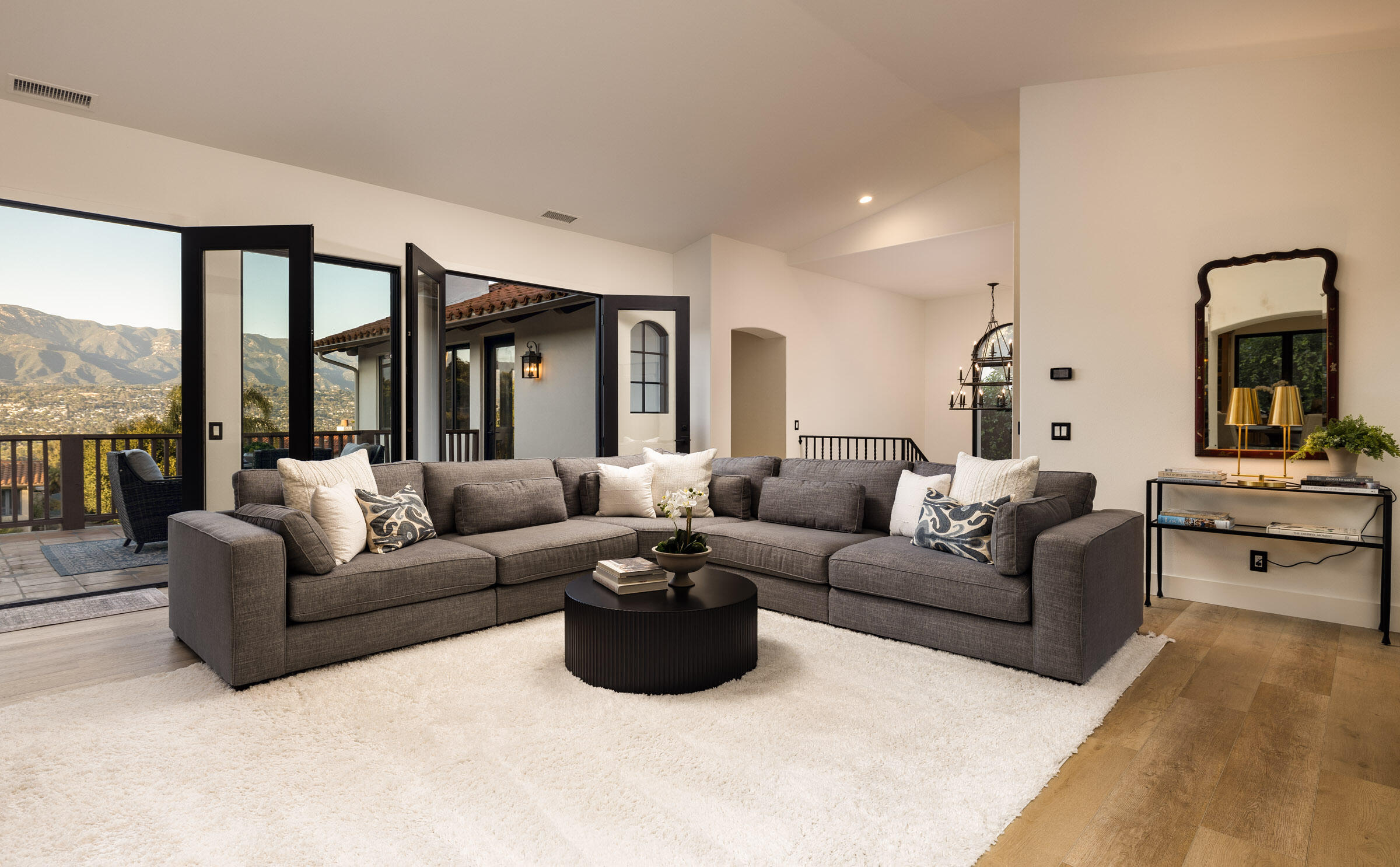 1215 Miracanon Lane Santa Barbara, CA 93109 - Photo 5 of 40 a living room with furniture and a large window
