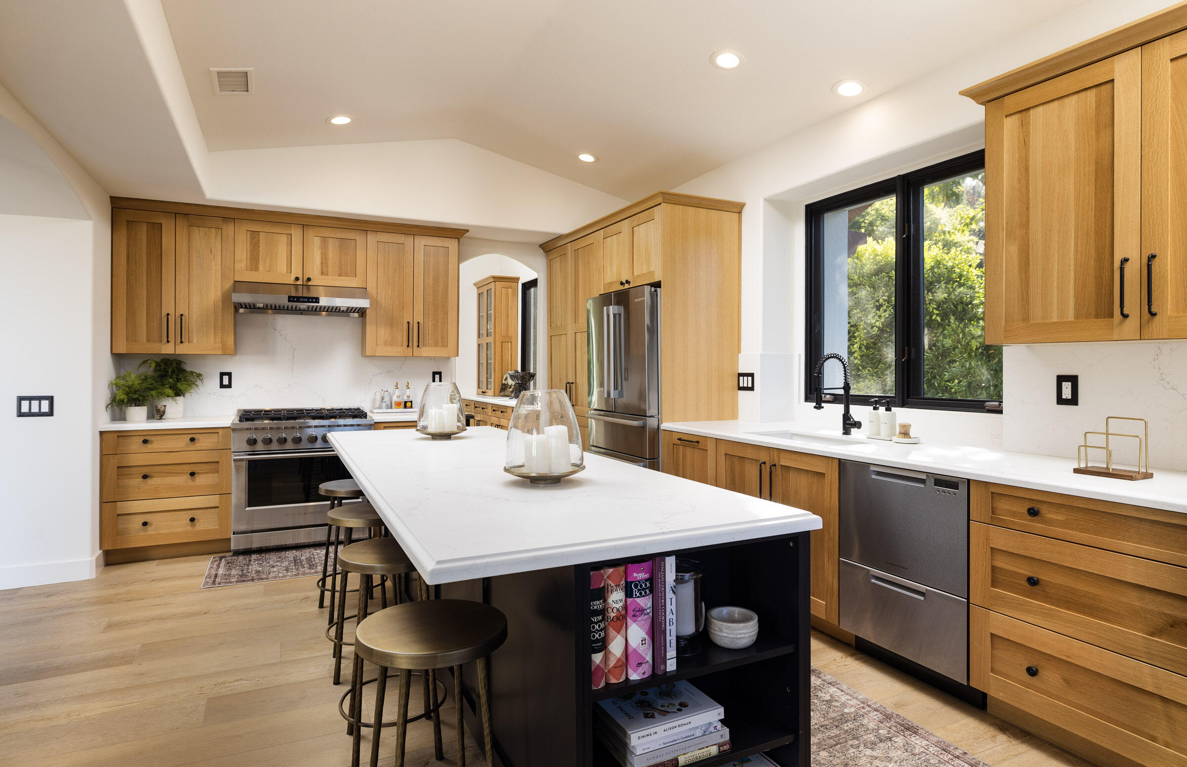 1215 Miracanon Lane Santa Barbara, CA 93109 - Photo 8 of 40 a kitchen with a stove a sink and a refrigerator