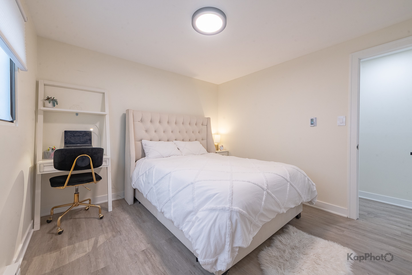 6612 West 64th Place, Unit 2W Chicago, IL 60638 - Photo 20 of 28 a bedroom with a bed and a chair