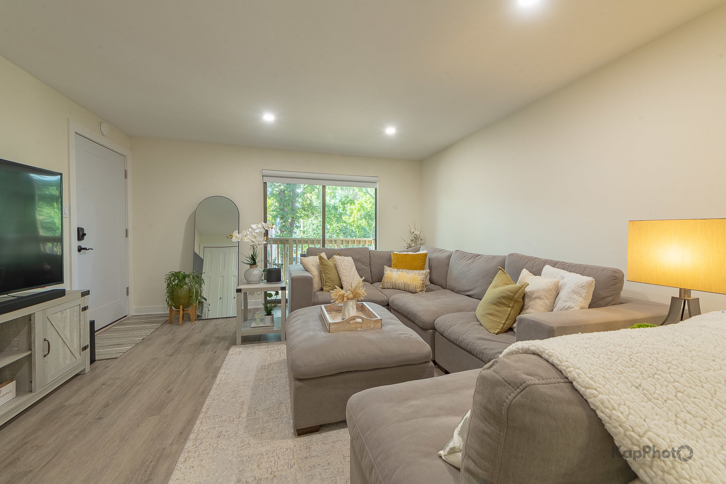 6612 West 64th Place, Unit 2W Chicago, IL 60638 - Photo 2 of 28 a living room with furniture and a flat screen tv