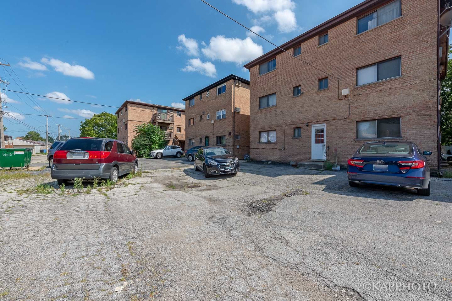6612 West 64th Place, Unit 2W Chicago, IL 60638 - Photo 28 of 28 a car parked in front of a building
