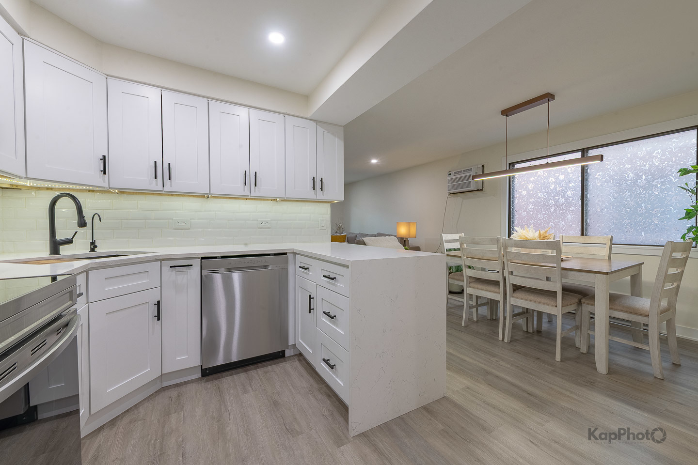 6612 West 64th Place, Unit 2W Chicago, IL 60638 - Photo 10 of 28 a kitchen with appliances a sink and cabinets