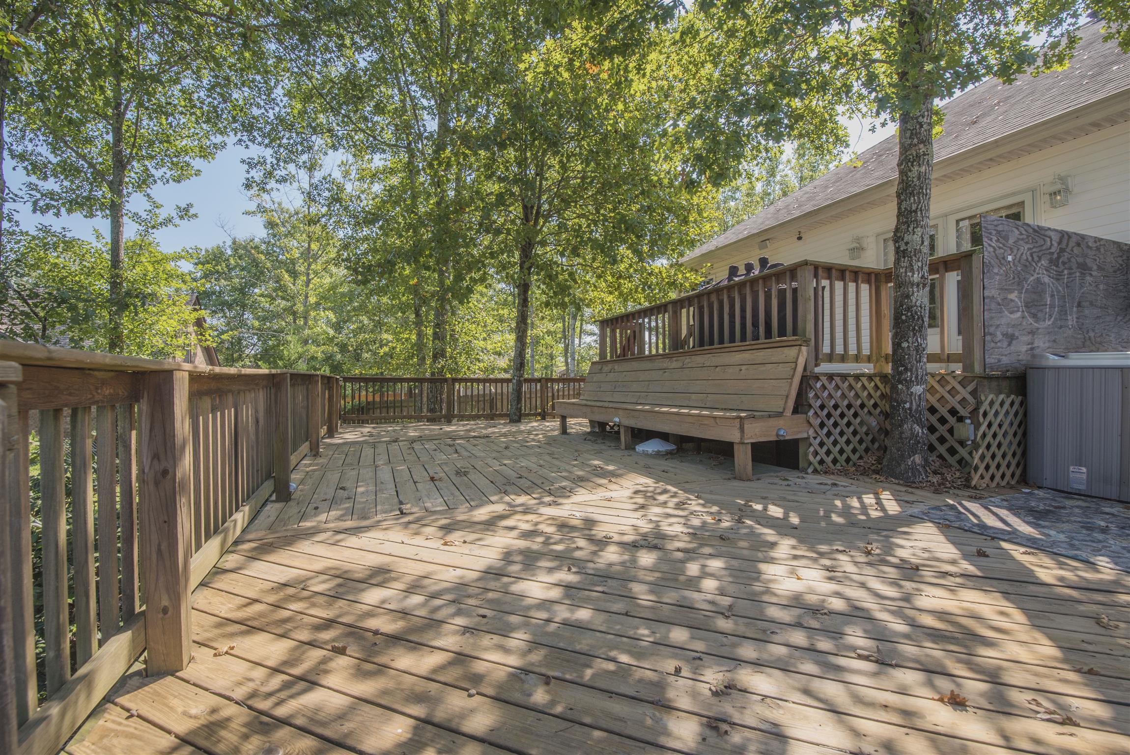 14904 Mt Pleasant Road Rockvale, TN 37153 - Photo 18 of 23 a view of a house with wooden fence next to a yard