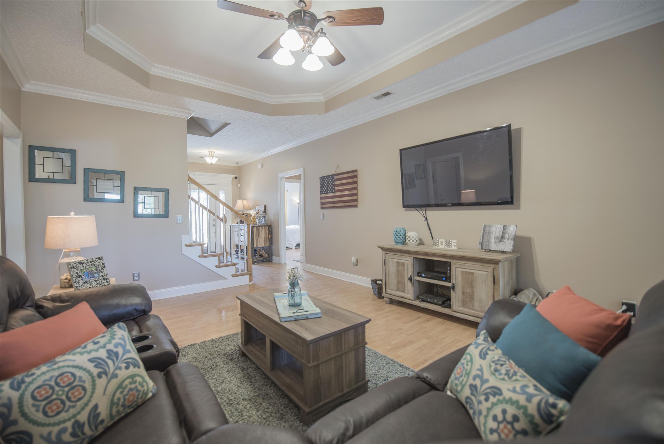 14904 Mt Pleasant Road Rockvale, TN 37153 - Photo 4 of 23 a living room with furniture and a flat screen tv