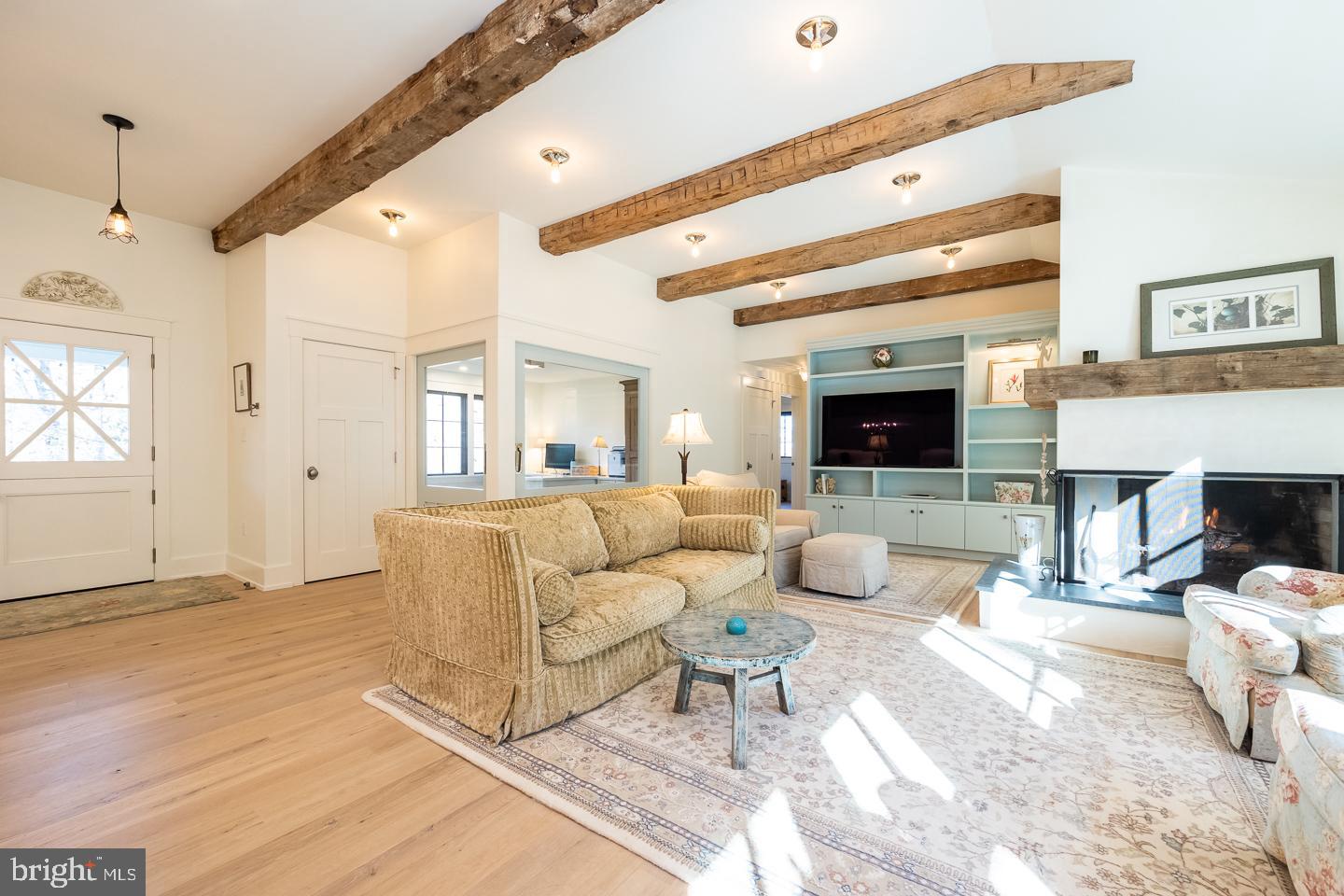 1256 Hollow Road Chester Springs, PA 19425 - Photo 1 of 79 Living room w/white oak flooring & barn beams