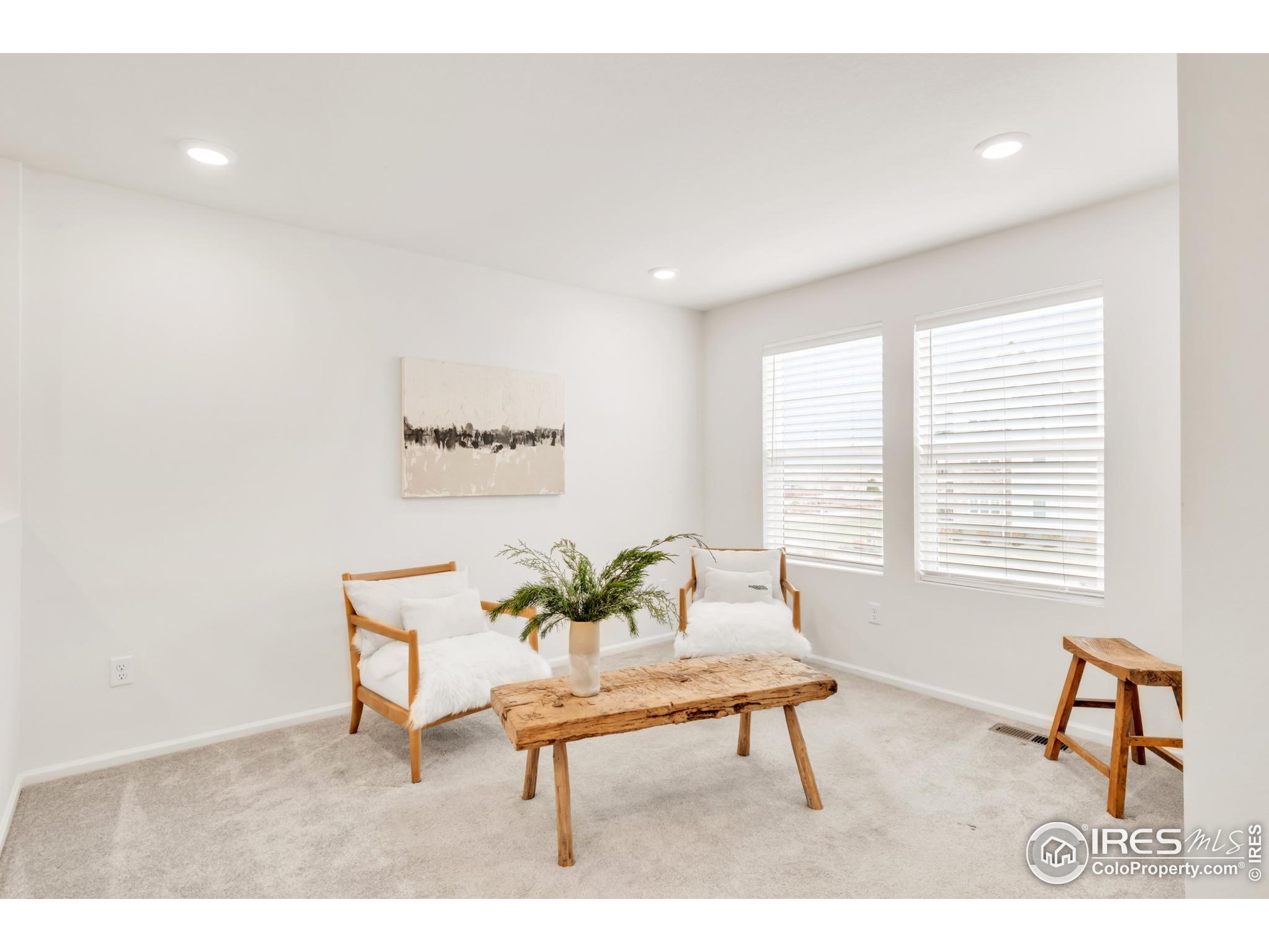 2455 Alpine Street Longmont, CO 80504 - Photo 14 of 30 a living room with furniture and a window