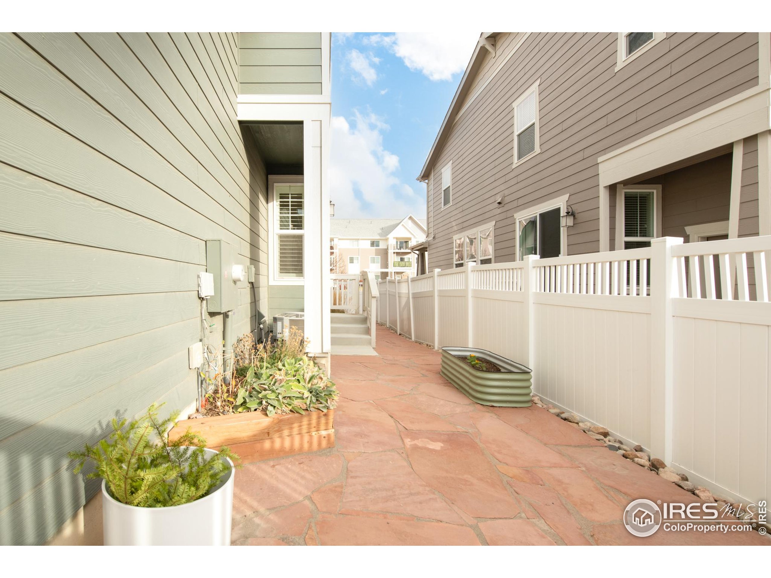 2455 Alpine Street Longmont, CO 80504 - Photo 29 of 30 a front view of a house