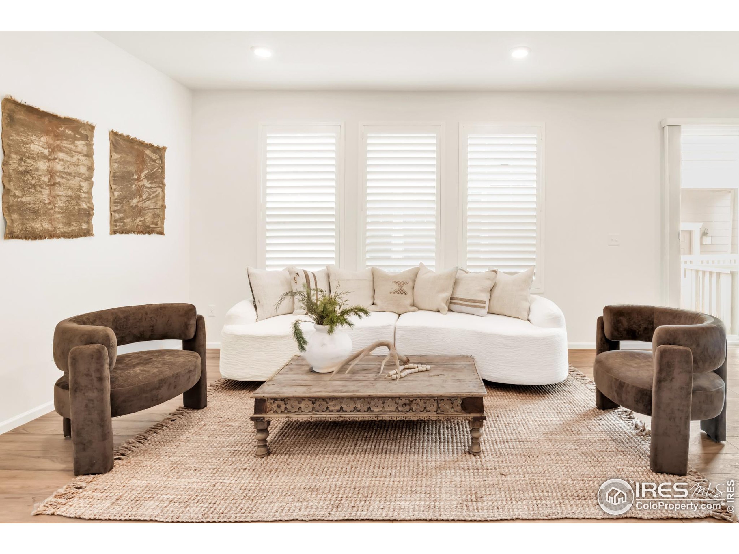 2455 Alpine Street Longmont, CO 80504 - Photo 6 of 30 a living room with furniture rug and window