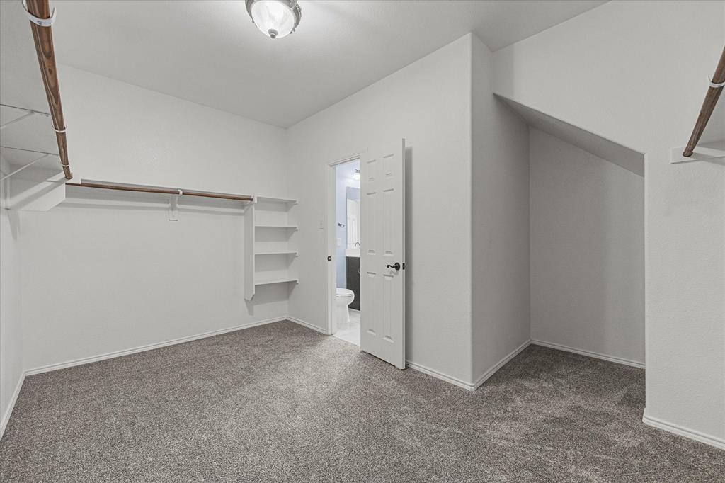 2217 Heaton Street Forney, TX 75126 - Photo 21 of 39 Extra-Large Primary Closet