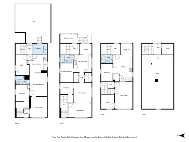 a front view of a building with a garden