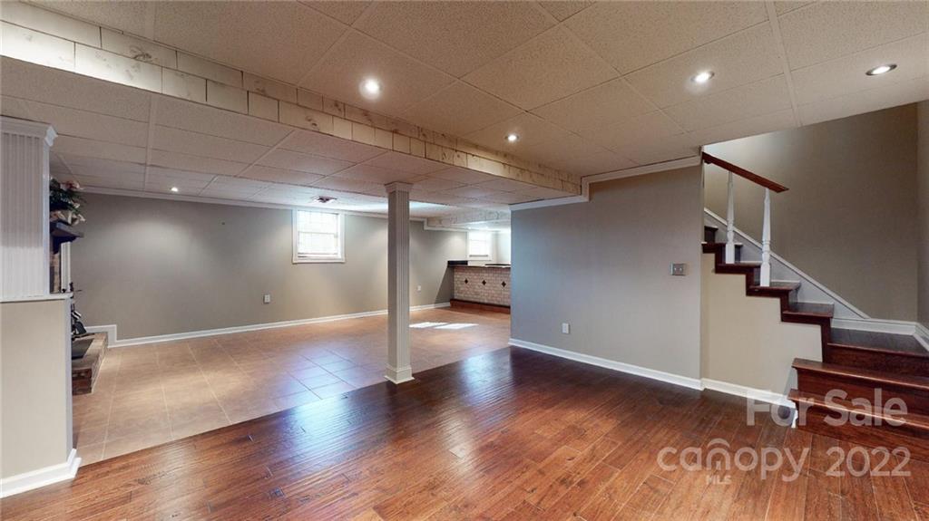 118 Patrick Road Gastonia, NC 28056 - Photo 29 of 45 a view of empty room with wooden floor