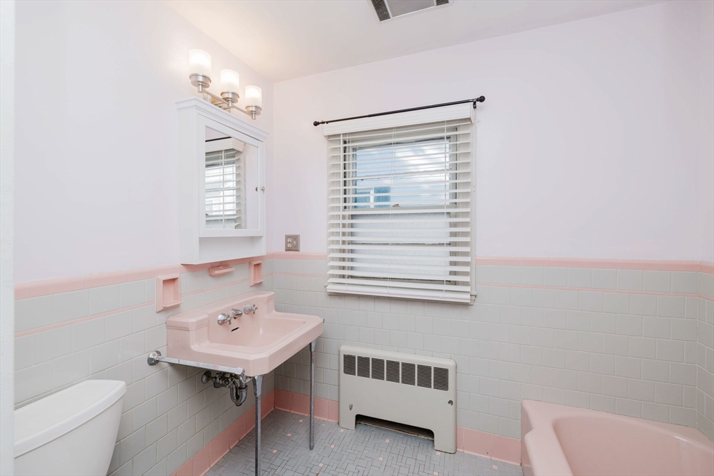 277 Valentine Street Fall River, MA 02720 - Photo 24 of 34 a bathroom with a sink toilet and a bathtub