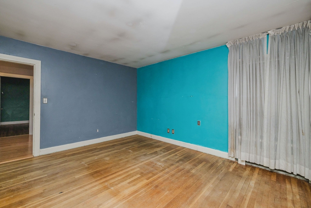 277 Valentine Street Fall River, MA 02720 - Photo 26 of 34 a view of empty room with wooden floor