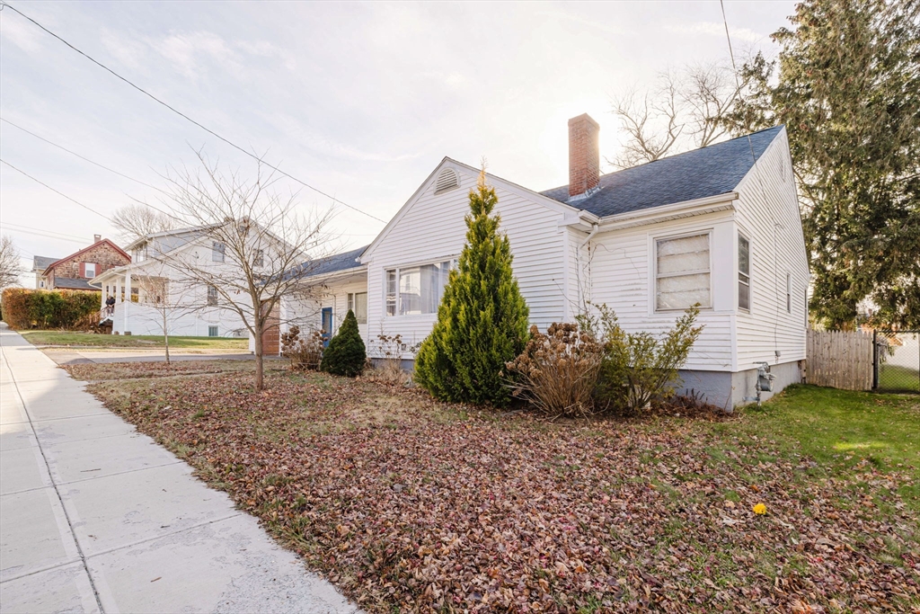 277 Valentine Street Fall River, MA 02720 - Photo 3 of 34 a front view of a house with garden