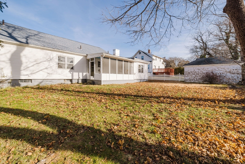 277 Valentine Street Fall River, MA 02720 - Photo 4 of 34 a front view of a house with a yard