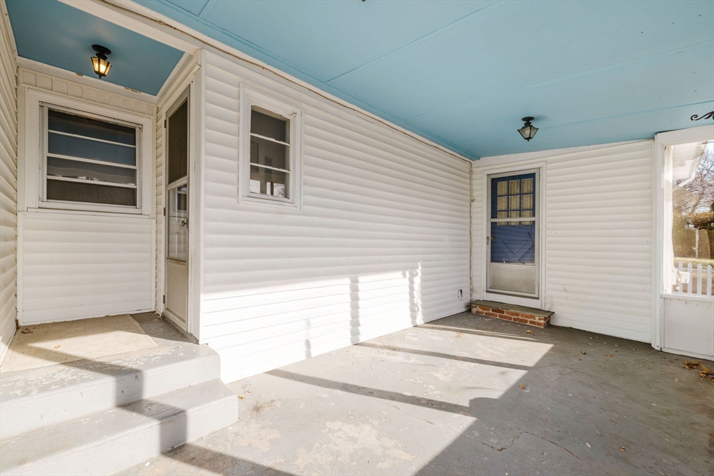 277 Valentine Street Fall River, MA 02720 - Photo 6 of 34 a view of two windows in back of house